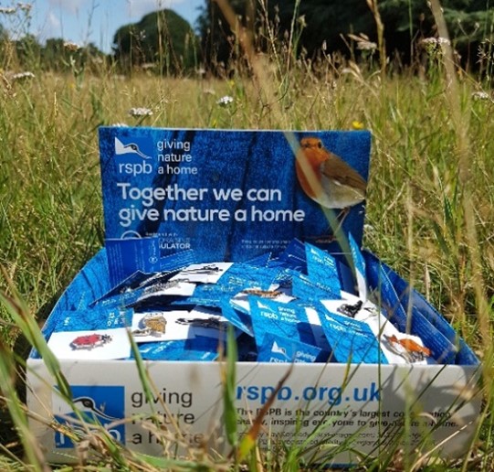 An example of a RSPB pin badge box