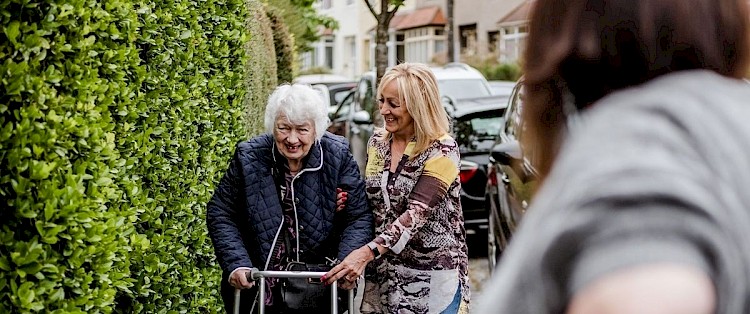 Volunteer driver helping an older person