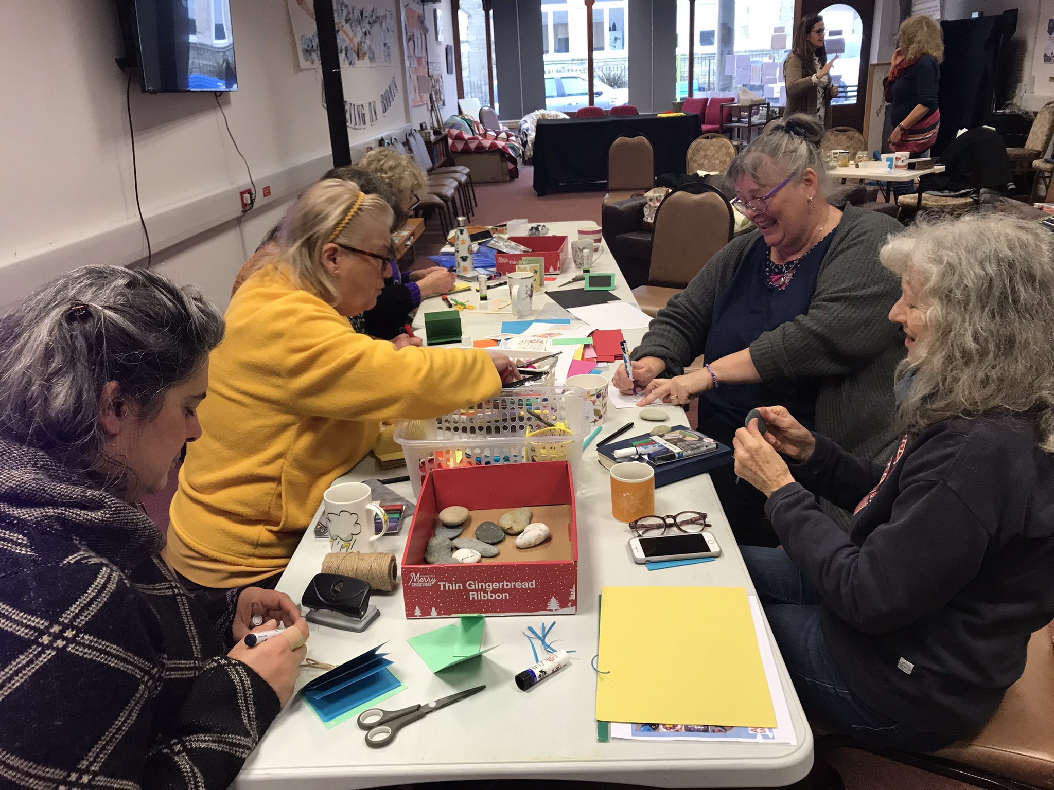 People engaged in craft activity