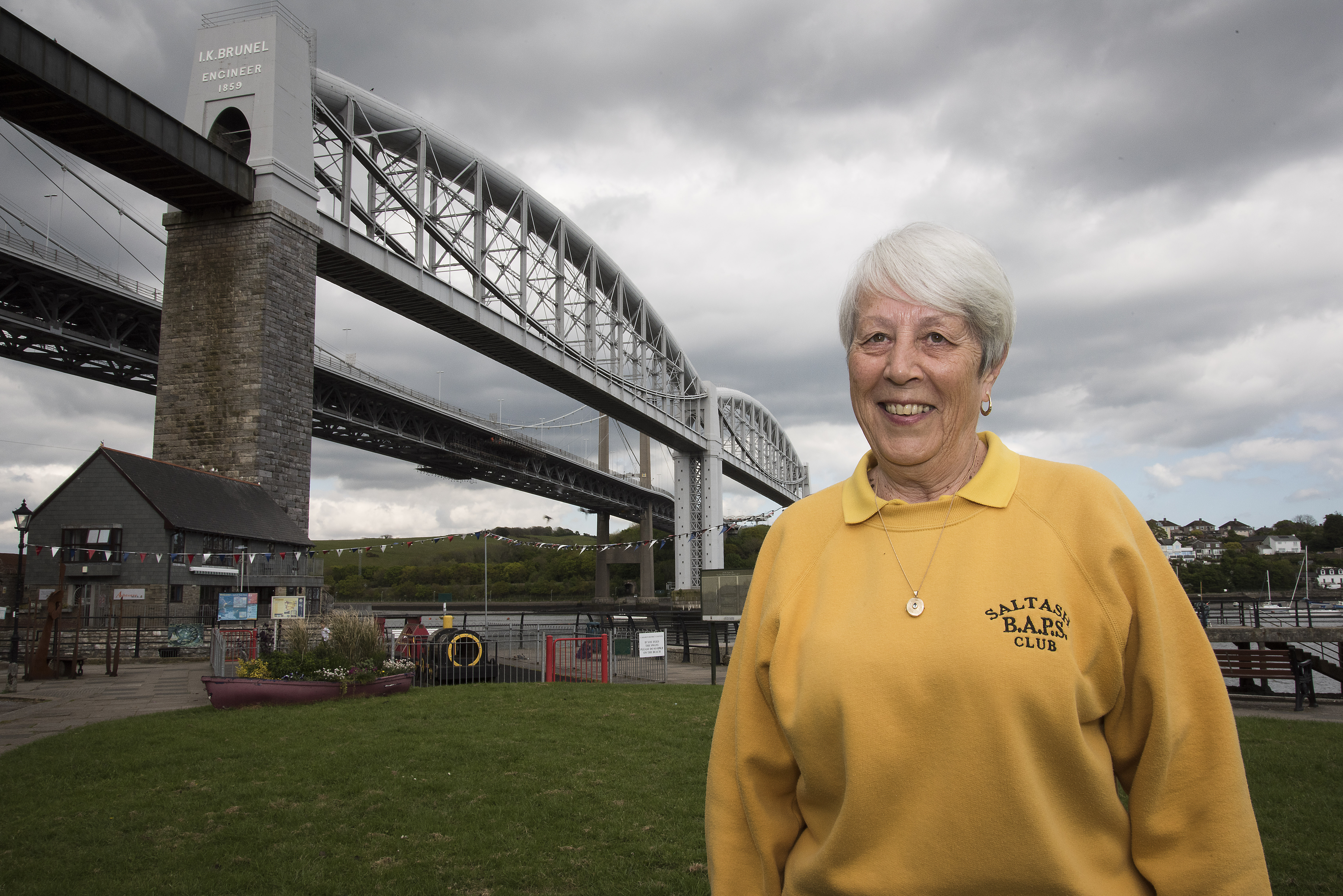 Photo of volunteer in front of the Tamar Bridge 