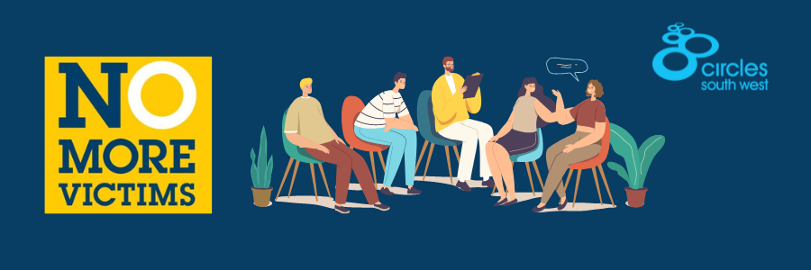 A group sat round in discussion