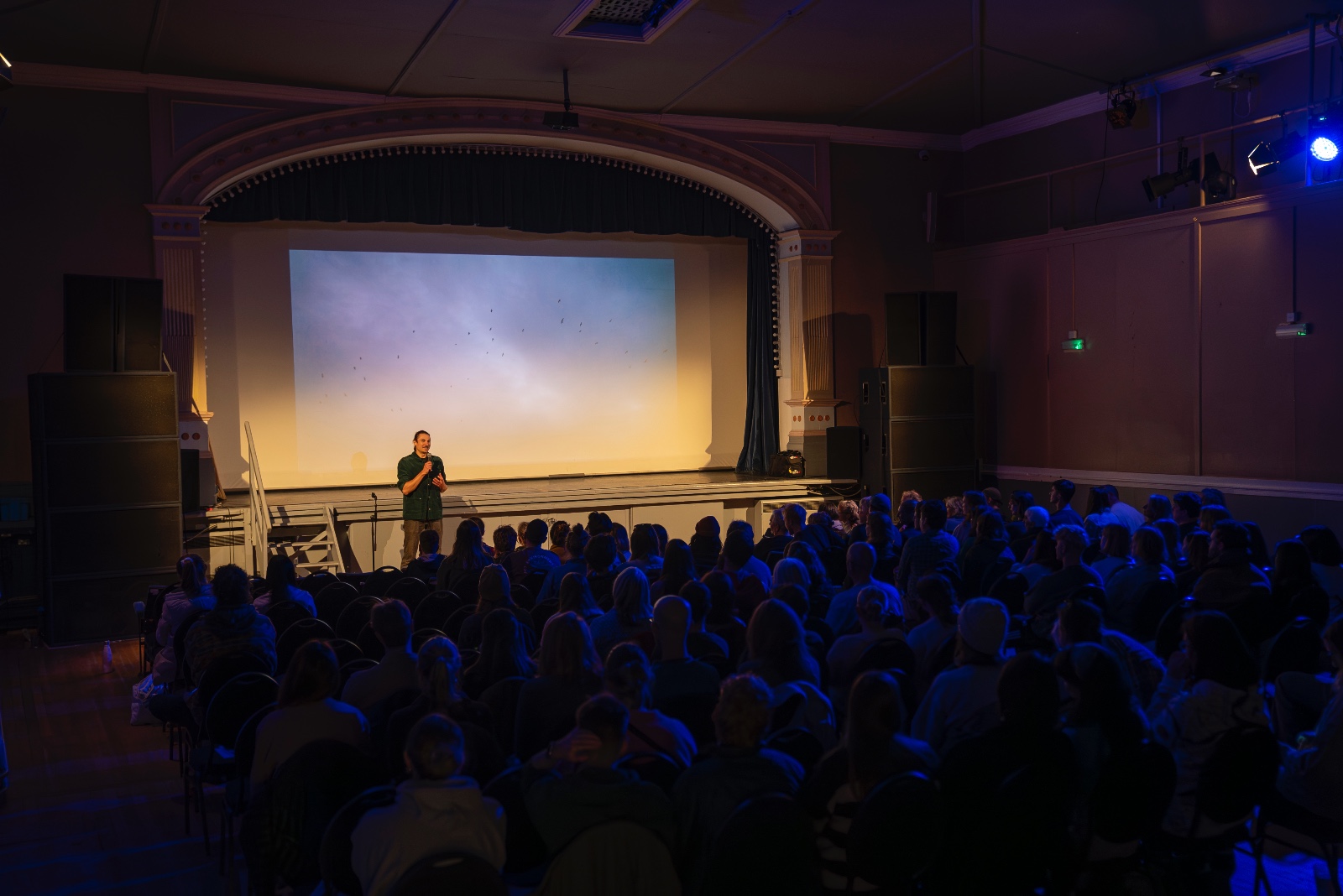 Founder Alex Fish presenting at a 99p Films event at Princess Pavillion.