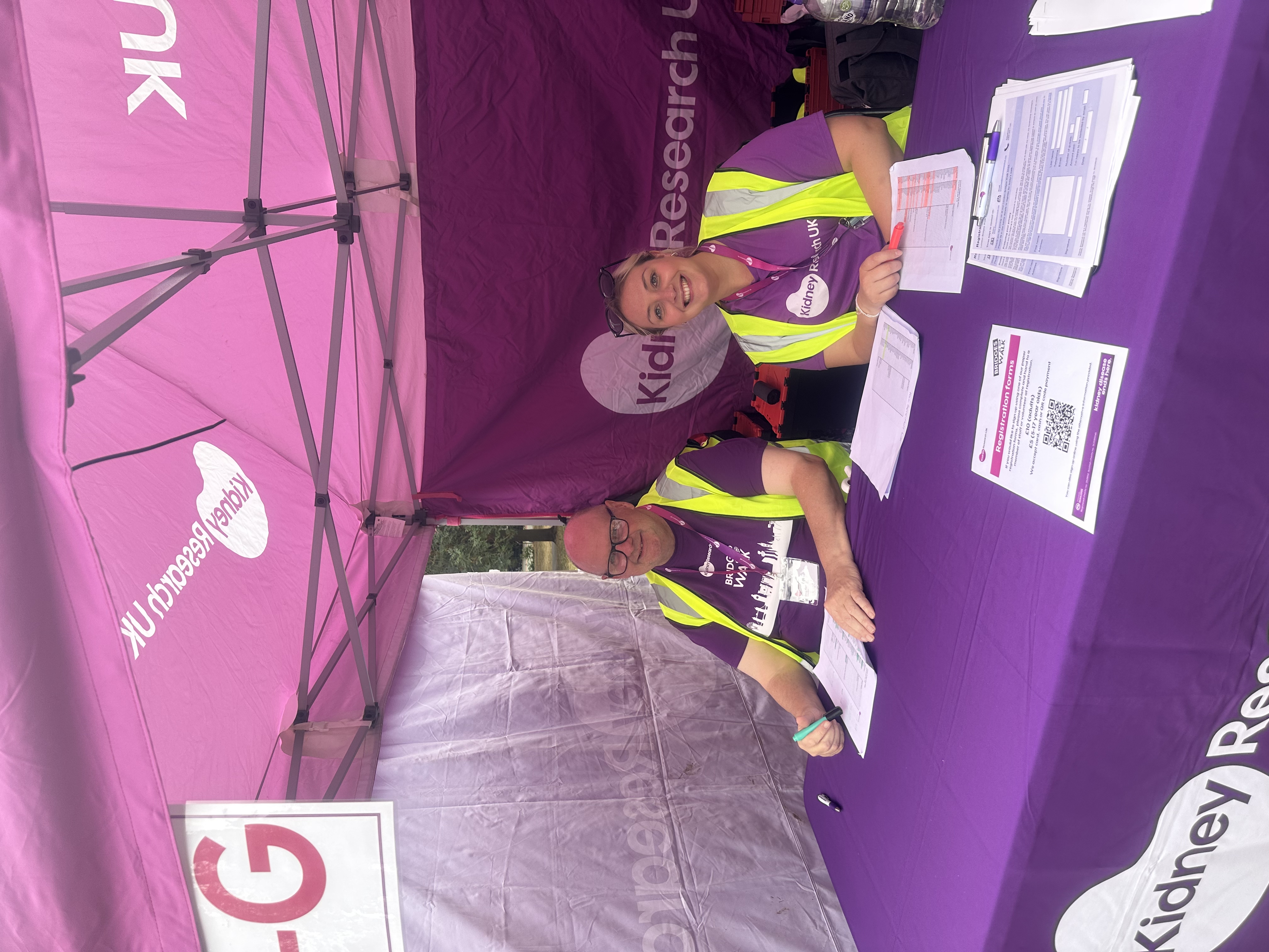 Volunteers at a Kidney health stand promoting kidney health to the public