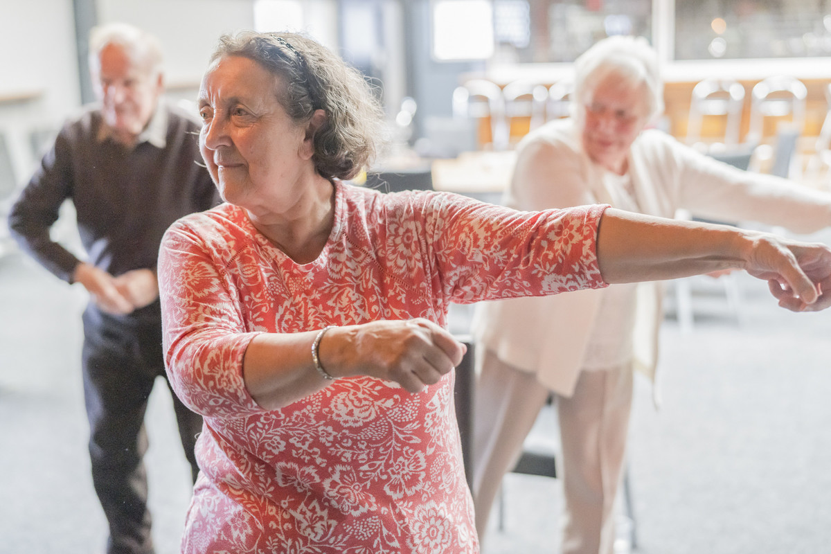the picture shows a small group enjoying one of our activity groups for people aged over 75