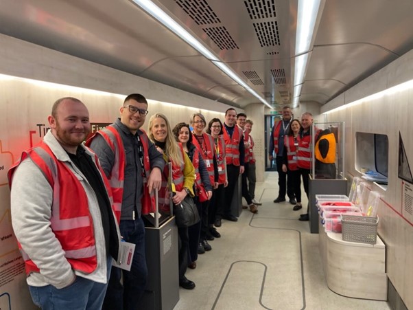 A group of smiling volunteers who helped when the train stopped in Edinburgh.