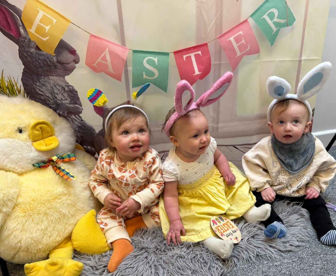 group of small children with easter banner