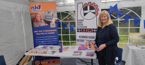 Image of information stand and a patient representative
