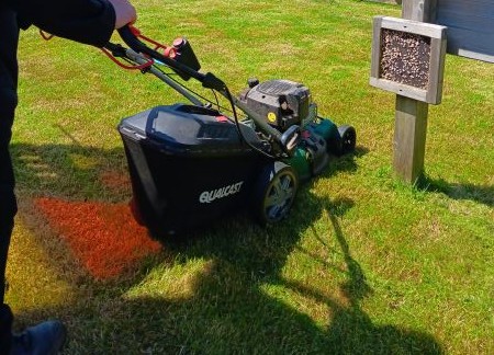 Moving the lawns at Hugs Foundation