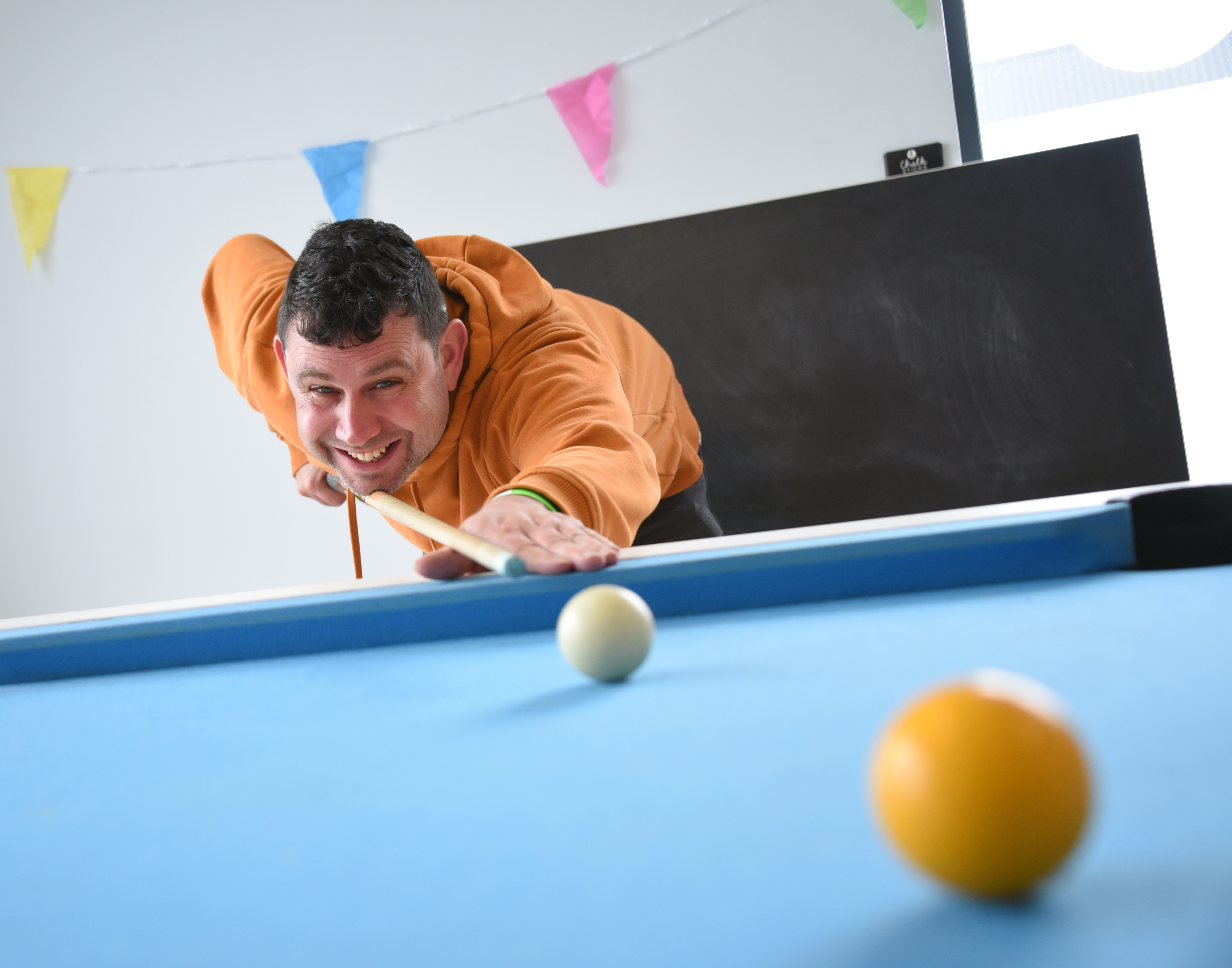 Volunteer Playing Pool
