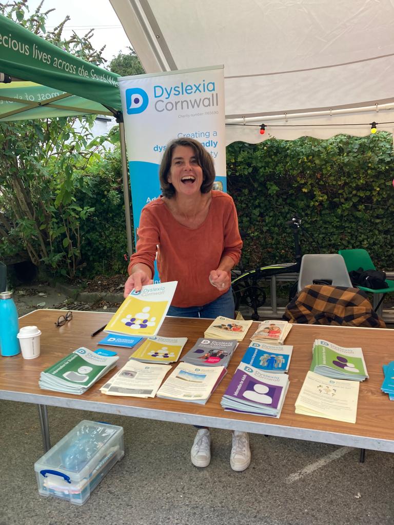 Image of a happy volunteer at a community event