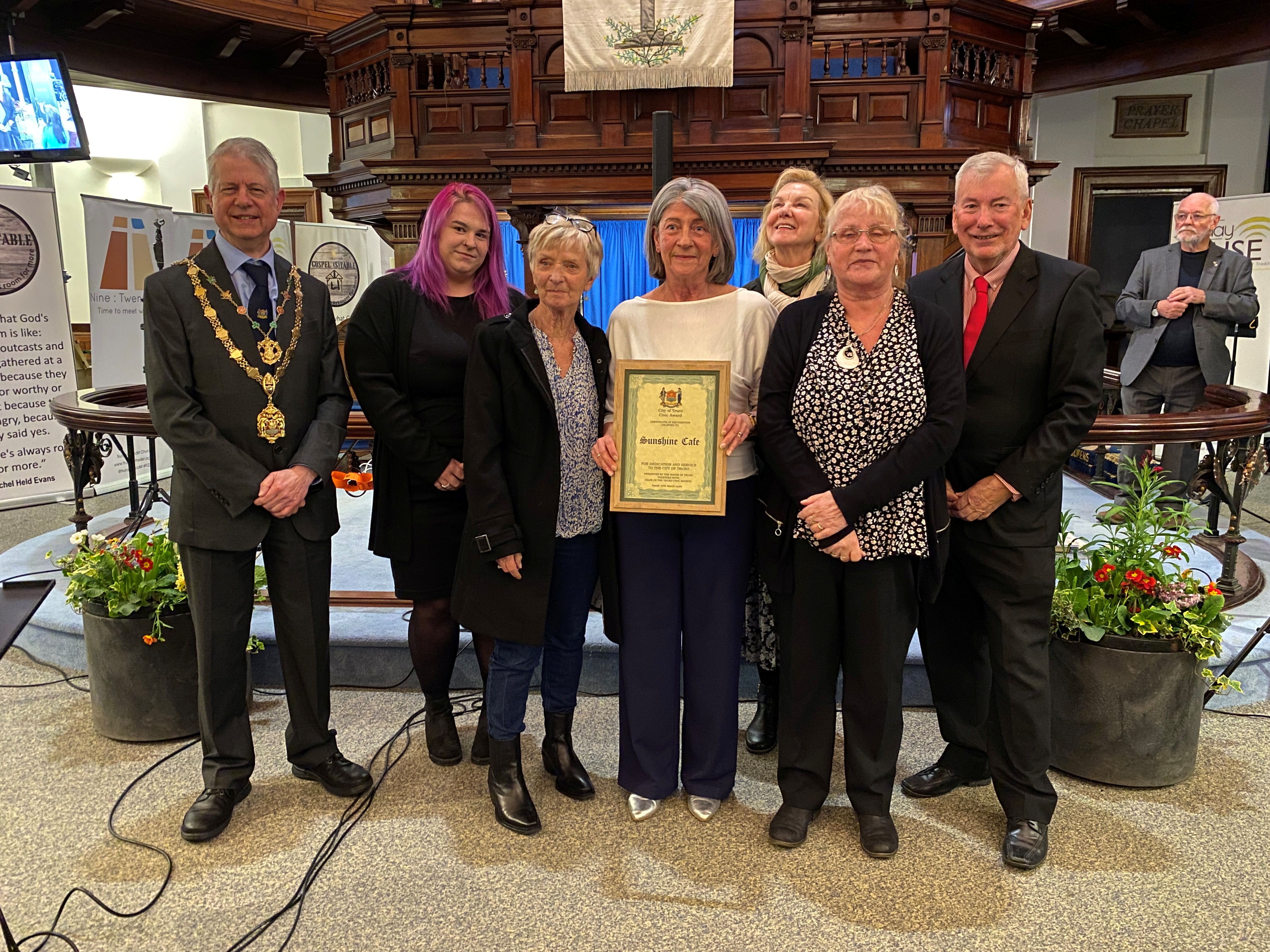 Volunteer receiving an award 