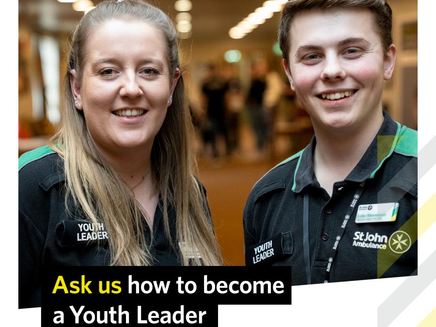 Image shows two St John Ambulance Youth Leaders interacting, inspiring young people around them