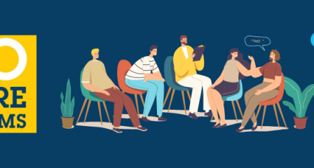 A group sat round in discussion