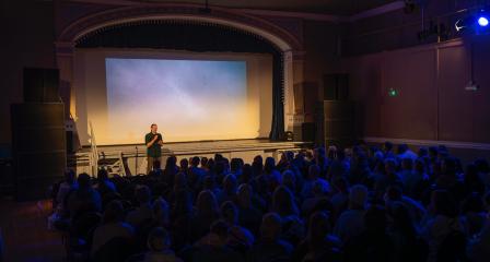 Founder Alex Fish presenting at a 99p Films event at Princess Pavillion.