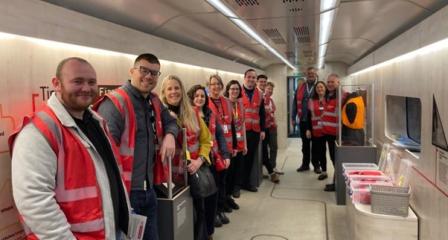 A group of smiling volunteers who helped when the train stopped in Edinburgh.