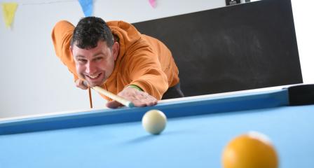Volunteer Playing Pool